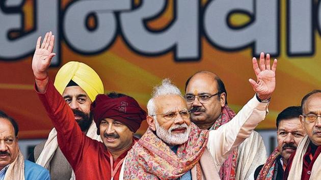 PM Modi said the Centre took over the process to confer ownership rights to four million residents of unauthorised colonies due to inordinate delay by the state government.(B Kinu/HT Photos) PM Modi said the Centre took over the process to confer ownership rights to four million residents of unauthorised colonies due to inordinate delay by the state government.(B Kinu/HT Photos)