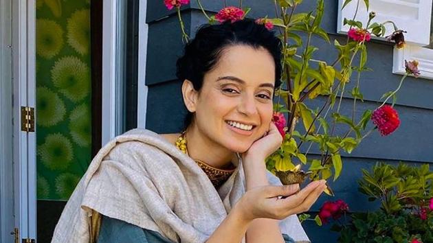 Kangana Ranaut poses for a photo as she celebrates Diwali at her new residence 'Kartik Niwas' in Manali.(PTI)