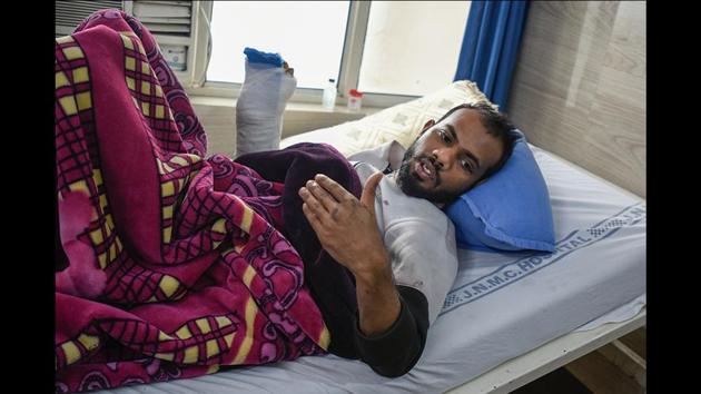 Nasir Chaman, 22, a second-year law student, was in his house when he started receiving messages about violent protests in JMI. “We could see policemen barging into the college and a mosque. They used tear gases and lathis on students,” said Chaman. In the violence that erupted during the march, Chaman’s right hand was injured while trying to dunk a tear gas shell into a bucket of water to defuse it. His thumb may have to be amputated. (Burhaan Kinu / HT Photo) Nasir Chaman, 22, a second-year law student, was in his house when he started receiving messages about violent protests in JMI. “We could see policemen barging into the college and a mosque. They used tear gases and lathis on students,” said Chaman. In the violence that erupted during the march, Chaman’s right hand was injured while trying to dunk a tear gas shell into a bucket of water to defuse it. His thumb may have to be amputated. (Burhaan Kinu / HT Photo)