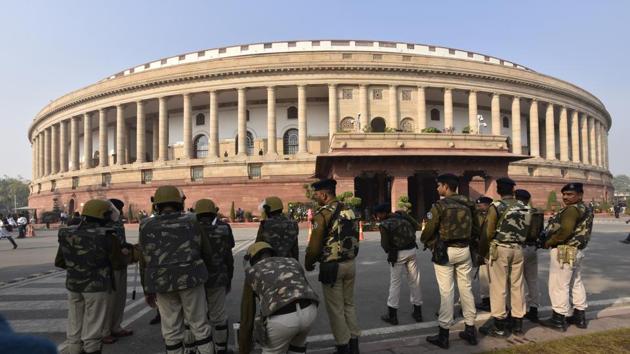 Security personnel seen during the ongoing winter session of Parliament, in New Delhi.(Sanjeev Verma/HT PHOTO)