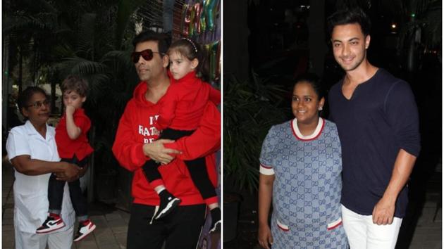 Karan Johar arrives with his twins to Arpita Khan’s Christmas party.