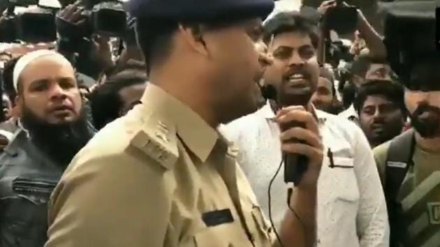 Bengaluru DCP Chetan Singh Rathore singing the national anthem along with the protesters during an anti-CAA agitation on December 19. (ANI Photo) Bengaluru DCP Chetan Singh Rathore singing the national anthem along with the protesters during an anti-CAA agitation on December 19. (ANI Photo)