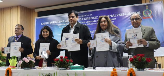 (From left) Ministry of home affairs joint secretary PS Srivastava, minister of state for home affairs Nityanand Rai, Chandigarh MP Kirron Kher and Dr Balram K Gupta releasing quality manuals at the Central Forensic Science Laboratory in Sector 36, Chandigarh, on Monday.(HT photo)
