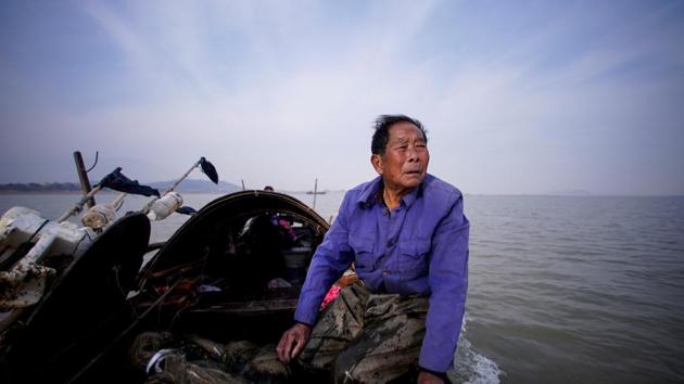 Cha Zhengnan, a fisherman, on his boat at Poyang Lake. On Jan. 1 2020, China will ban fishing in sensitive regions along the Yangtze, China’s longest river, and by the start of 2021, fishing throughout the Poyang itself will be prohibited for at least 10 years. Fan said he and as many as 100,000 other fishermen were being unfairly blamed for mounting local environmental problems and must now find other ways to make a living. (Aly Song / REUTERS) Cha Zhengnan, a fisherman, on his boat at Poyang Lake. On Jan. 1 2020, China will ban fishing in sensitive regions along the Yangtze, China’s longest river, and by the start of 2021, fishing throughout the Poyang itself will be prohibited for at least 10 years. Fan said he and as many as 100,000 other fishermen were being unfairly blamed for mounting local environmental problems and must now find other ways to make a living. (Aly Song / REUTERS)