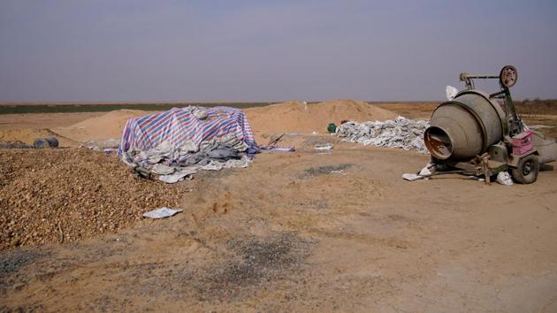 Remnants of a construction site stand on the dried lake bed. “Sand mining has made the drainage channel (in the northern part of the lake) deeper and wider” accelerating the draining, he said. Zhang said quarrying by giant dredgers had hit fishing hard, with deeper lake beds making it harder for fishermen to deploy their nets. The sand industry had also damaged the lake’s ecosystem, he said. (Aly Song / REUTERS) Remnants of a construction site stand on the dried lake bed. “Sand mining has made the drainage channel (in the northern part of the lake) deeper and wider” accelerating the draining, he said. Zhang said quarrying by giant dredgers had hit fishing hard, with deeper lake beds making it harder for fishermen to deploy their nets. The sand industry had also damaged the lake’s ecosystem, he said. (Aly Song / REUTERS)