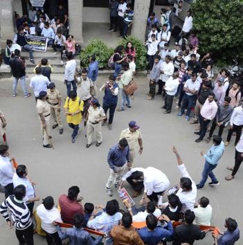 Two student groups — Nationalist Congress Party (NCP) students wing and BJP Yuva Morcha-- chanted slogans on Citizenship Amendment Act at Fergusson College on Monday. The Deccan Gymkhana police officials had to intervene as the protest got out of hand. (Ravindra Joshi/HT PHOTO) Two student groups — Nationalist Congress Party (NCP) students wing and BJP Yuva Morcha-- chanted slogans on Citizenship Amendment Act at Fergusson College on Monday. The Deccan Gymkhana police officials had to intervene as the protest got out of hand. (Ravindra Joshi/HT PHOTO)