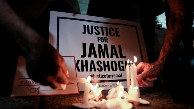 The Committee to Protect Journalists and other press freedom activists hold a candlelight vigil in front of the Saudi Embassy in Washington D.C. to mark the anniversary of the killing of journalist Jamal Khashoggi.(REUTERS) The Committee to Protect Journalists and other press freedom activists hold a candlelight vigil in front of the Saudi Embassy in Washington D.C. to mark the anniversary of the killing of journalist Jamal Khashoggi.(REUTERS)