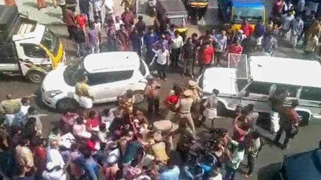 Kannur: Police detain DYFI activists who blocked Karnataka Chief minister BS Yediyurappa’s vehicle during a protest in Kannur(PTI Photo) Kannur: Police detain DYFI activists who blocked Karnataka Chief minister BS Yediyurappa’s vehicle during a protest in Kannur(PTI Photo)