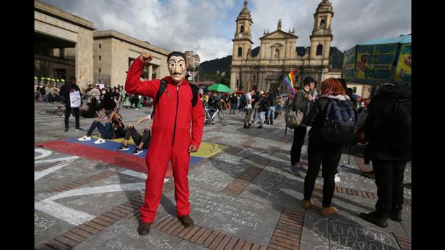 Teacher Andres Felipe Vargas, 52, during a national strike in Bogota, Colombia. “The government that is currently in Colombia is an extreme right-wing government that wants to take away more and more of our rights... it is a government that only wants to encourage inequality, Colombia is the third most unequal country in the world,” Vargas said. “Throughout history it has been seen that things don’t just happen, things change with revolutions” (Luisa Gonzalez / REUTERS) Teacher Andres Felipe Vargas, 52, during a national strike in Bogota, Colombia. “The government that is currently in Colombia is an extreme right-wing government that wants to take away more and more of our rights... it is a government that only wants to encourage inequality, Colombia is the third most unequal country in the world,” Vargas said. “Throughout history it has been seen that things don’t just happen, things change with revolutions” (Luisa Gonzalez / REUTERS)