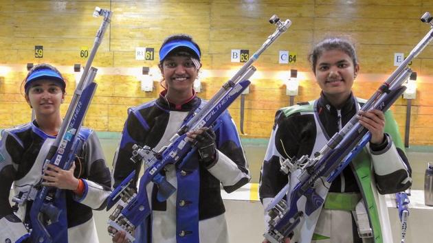 Elavenil Valarivan (C), Bronz medalist Manini Kaushik (R) and silver medalist Mehuli Ghosh (L) pose.(PTI)