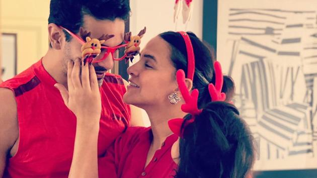 Angad Bedi and Neha Dhupia also posted a picture of their first Christmas celebration with daughter Mehr. The trio were all dressed in red, with Mehr sporting the cutest, tiniest antlers and tulle skirt. Neha wrote, “Merry Christmas from us to you.” (INSTAGRAM) Angad Bedi and Neha Dhupia also posted a picture of their first Christmas celebration with daughter Mehr. The trio were all dressed in red, with Mehr sporting the cutest, tiniest antlers and tulle skirt. Neha wrote, “Merry Christmas from us to you.” (INSTAGRAM)