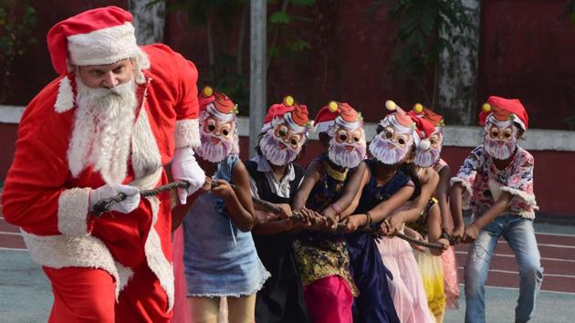 Actor J. Brandon Hill dressed up as Santa Claus and distributed presents to the children of sex workers on the occasion of Christmas, at Byculla in Mumbai, Maharashtra. (Bhushan Koyande / HT Photo) Actor J. Brandon Hill dressed up as Santa Claus and distributed presents to the children of sex workers on the occasion of Christmas, at Byculla in Mumbai, Maharashtra. (Bhushan Koyande / HT Photo)