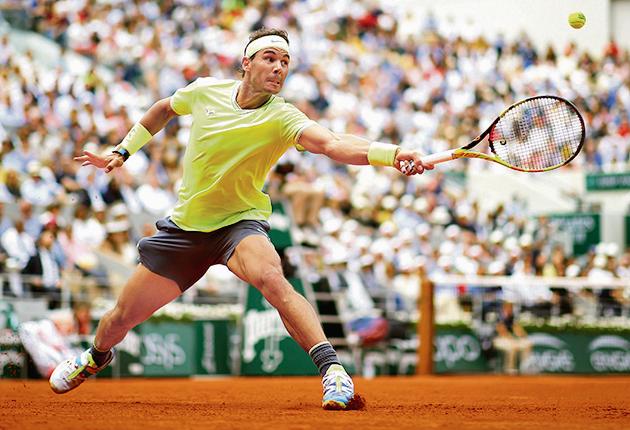 At the Nadal v Nishikori 2019 French Open quarterfinal in Paris. ‘I was there, and the crowd just couldn’t get enough,’ says Manoj Balaji, 35. It helps that the biggest tennis tournaments — the four Grand Slams — are held in some of the most popular cities in the world.(Getty Images)