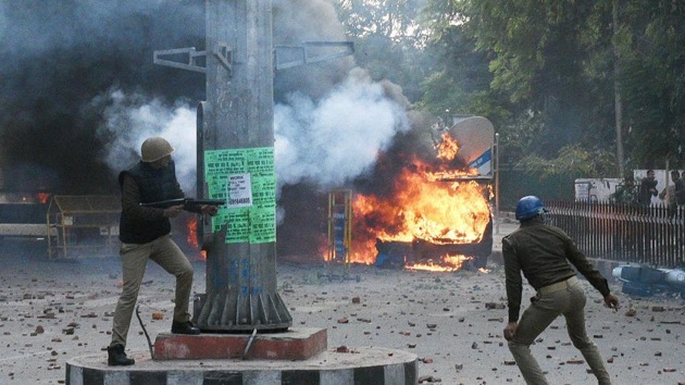 Police personnel fire tear gas shells towards demonstrators during an anti Citizenship Amendment Act (CAA) and National Register of Citizens (NRC) protest at Parivartan Chowk area of Lucknow, Uttar Pradesh. (Dheeraj Dhawan/Hindustan Times) Police personnel fire tear gas shells towards demonstrators during an anti Citizenship Amendment Act (CAA) and National Register of Citizens (NRC) protest at Parivartan Chowk area of Lucknow, Uttar Pradesh. (Dheeraj Dhawan/Hindustan Times)