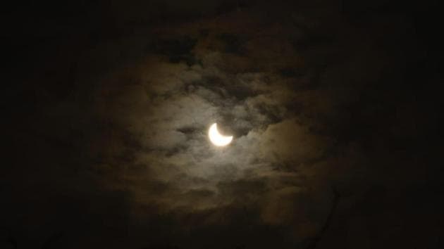 Partial solar eclipse seen from Nehru Planetarium in Mumbai.(Anshuman Poyrekar/HT Photo)