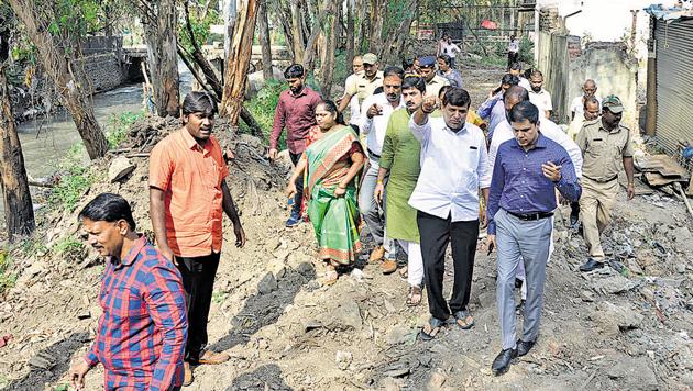 While work for the retaining wall is still to begin, the PMC hasn’t removed trash and other waste, including vehicles which were swept away by the flow of water during the flash floods. (HT FILE) While work for the retaining wall is still to begin, the PMC hasn’t removed trash and other waste, including vehicles which were swept away by the flow of water during the flash floods. (HT FILE)