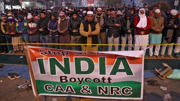 Local residents offer prayers on a road during the protest. The protesters are a diverse group with individuals from different professions like banking, pharma, among others. Students from engineering colleges, Delhi University and other institutions are active participants in the protest, reports Reuters. (Anushree Fadnavis / REUTERS)