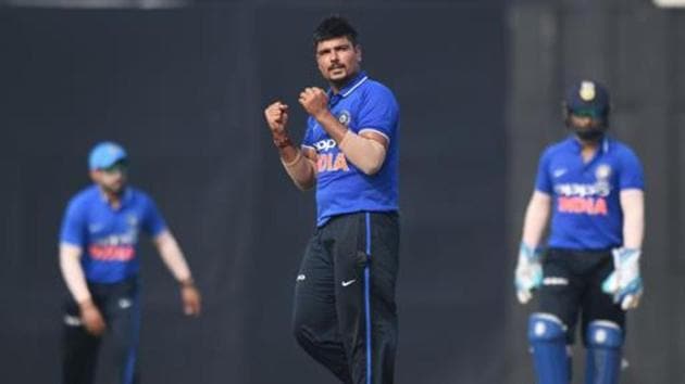 India A bowler Karn Sharma (C) celebrates after taking the wicket of New Zealand captain Kane Williamson.(AFP)