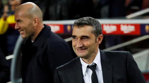 Barcelona coach Ernesto Valverde and Real Madrid coach Zinedine Zidane (REUTERS) Barcelona coach Ernesto Valverde and Real Madrid coach Zinedine Zidane (REUTERS)