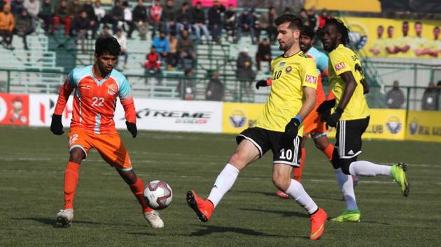 Players from the Real Kashmir and Chennai City football clubs seen in action.(HT Photo)