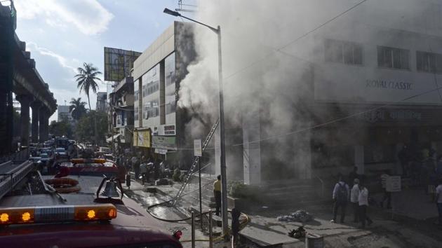 A fire broke out at the Royal Classic furniture store located on Karve road on Thursday.(Ravindra Joshi/HT PHOTO)