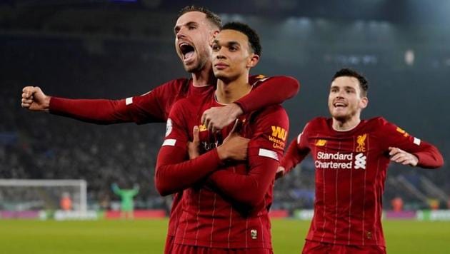 Liverpool's Trent Alexander-Arnold celebrates scoring their fourth goal with Jordan Henderson and Andrew Robertson.(REUTERS) Liverpool's Trent Alexander-Arnold celebrates scoring their fourth goal with Jordan Henderson and Andrew Robertson.(REUTERS)