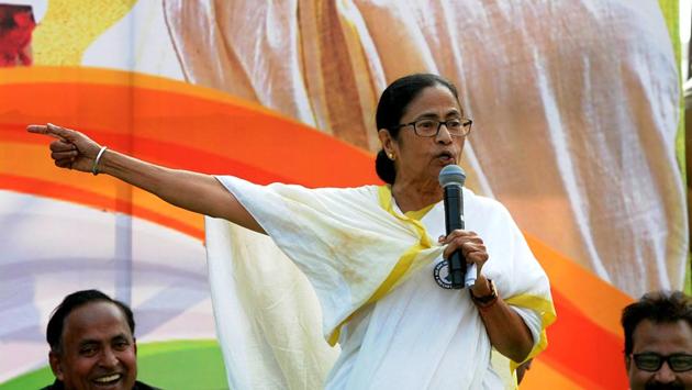 West Bengal Chief Minister Mamata Banerjee addresses Trinamool Congress supporters during a protest rally against CAA and NRC, in Kolkata on Tuesday.(ANI Photo)