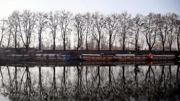 Houseboats moored on the banks of Dal Lake during a winter day in Srinagar.(ANI Photo) Houseboats moored on the banks of Dal Lake during a winter day in Srinagar.(ANI Photo)