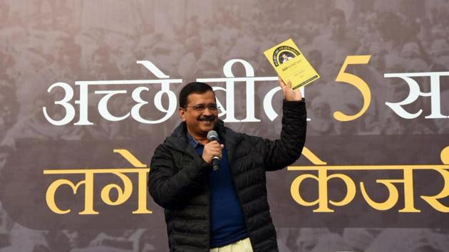Delhi Chief Minister Arvind Kejriwal holds a copy of ‘Aap Ka report Card’ during the Second Town Hall Meeting at Peetampura in New Delhi. (ANI Photo) Delhi Chief Minister Arvind Kejriwal holds a copy of ‘Aap Ka report Card’ during the Second Town Hall Meeting at Peetampura in New Delhi. (ANI Photo)