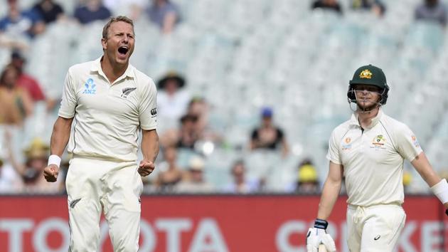 New Zealand's Neil Wagner, left, celebrates capturing the wicket of Australia's Steven Smith, right, during their cricket test match in Melbourne, Australia, Saturday, Dec. 28, 2019..(AP)