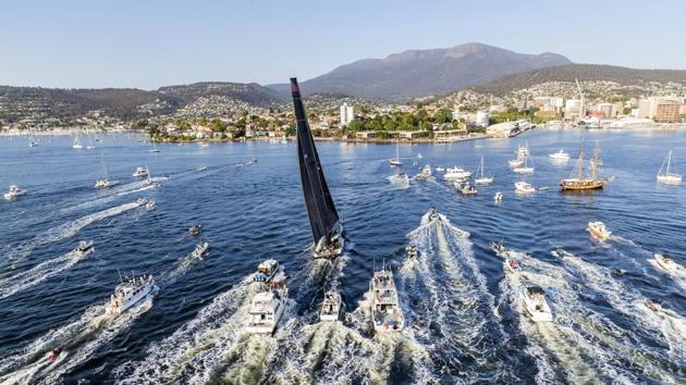 Comanche yacht (C), surrounded by spectator craft on arrival at Hobart, Australia, to claim victory in the Sydney to Hobart yacht race. (Carlo Borlenghi / Rolex / AP) Comanche yacht (C), surrounded by spectator craft on arrival at Hobart, Australia, to claim victory in the Sydney to Hobart yacht race. (Carlo Borlenghi / Rolex / AP)