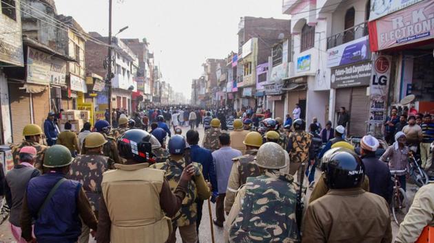 Police personnel attempt to disperse protestors demonstrating against the Citizenship (Amendment) Act, in Ayodhya. (Photo: PTI) Police personnel attempt to disperse protestors demonstrating against the Citizenship (Amendment) Act, in Ayodhya. (Photo: PTI)