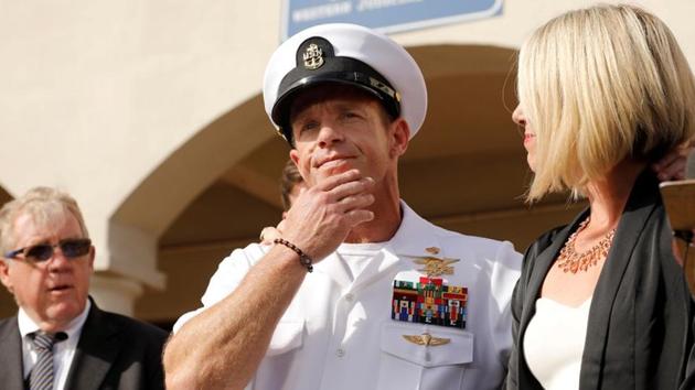 US Navy SEAL Special Operations Chief Edward Gallagher prepares to answer a question from the media with wife Andrea Gallagher after being acquitted on most of the serious charges against him during his court-martial trial at Naval Base San Diego.(REUTERS) US Navy SEAL Special Operations Chief Edward Gallagher prepares to answer a question from the media with wife Andrea Gallagher after being acquitted on most of the serious charges against him during his court-martial trial at Naval Base San Diego.(REUTERS)
