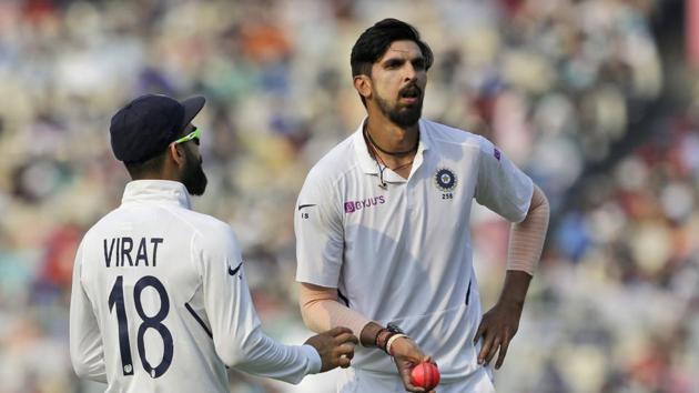 India's captain Virat Kohli talks to Ishant Sharma.(AP)