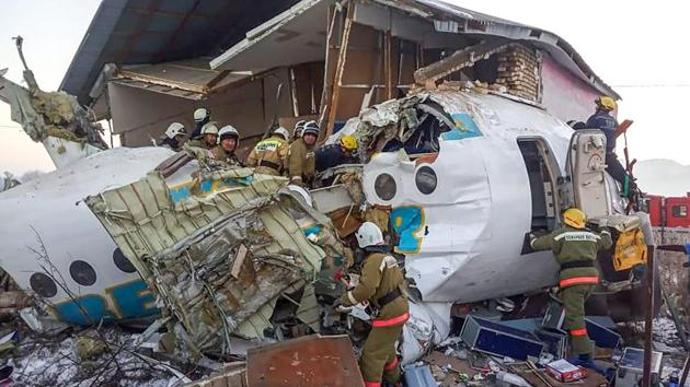 Rescuers work at the site of a passenger plane crash outside Almaty. At least 12 people died when a passenger plane carrying 100 people crashed into a house shortly after takeoff from Kazakhstan’s largest city. (AFP) Rescuers work at the site of a passenger plane crash outside Almaty. At least 12 people died when a passenger plane carrying 100 people crashed into a house shortly after takeoff from Kazakhstan’s largest city. (AFP)