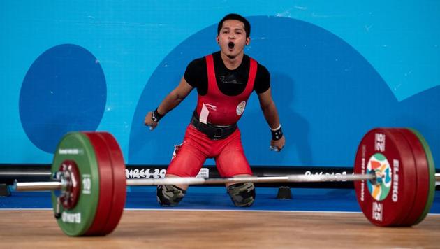Lalrinnunga Jeremy IND roars in delight after taking the Gold Medal with a successful lift of 150kg.(REUTERS)