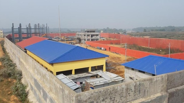 Work on the detention centre started in December. Besides the housing quarters, the facility, which is surrounded by 20-22 feet high boundary walls, will contain a staff quarters, hospital, school, an office complex, kitchen and dining and community space.((Utpal Parashar/HT))