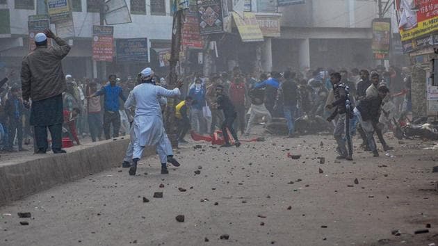 Protestors pelt stones during a rally against the Citizenship Amendment Act (CAA), in Kanpur.(PTI)