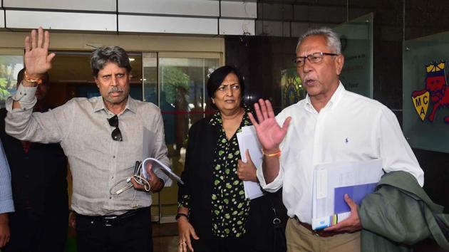 Former India captain Kapil Dev along with Anshuman Gaekwad and Shantha Rangaswamy(PTI)