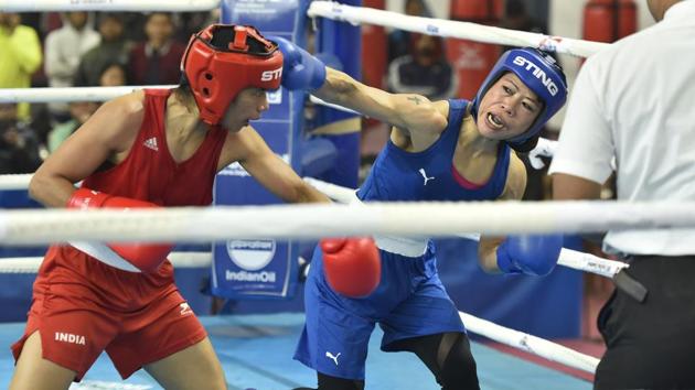 Boxers Mary Kom and Nikhat Zareen during their 51 kg category finals bout of the women's boxing trials for Olympics 2020 qualifiers at Indira Gandhi Indoor Stadium in New Delhi. Mary Kom won the match. (Sanjeev Verma / HT Photo)