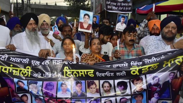 Relatives and family members of the victims of last year’s Dussehra Train Tragedy light candles and march towards Jaura Phatak, demanding justice, almost a year after the tragedy, in Amritsar.(Sameer Sehgal/Hindustan Times) Relatives and family members of the victims of last year’s Dussehra Train Tragedy light candles and march towards Jaura Phatak, demanding justice, almost a year after the tragedy, in Amritsar.(Sameer Sehgal/Hindustan Times)