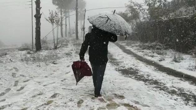 Snowfall in Luvishe village in Zunheboto district of Nagaland. (TWITTER.) Snowfall in Luvishe village in Zunheboto district of Nagaland. (TWITTER.)