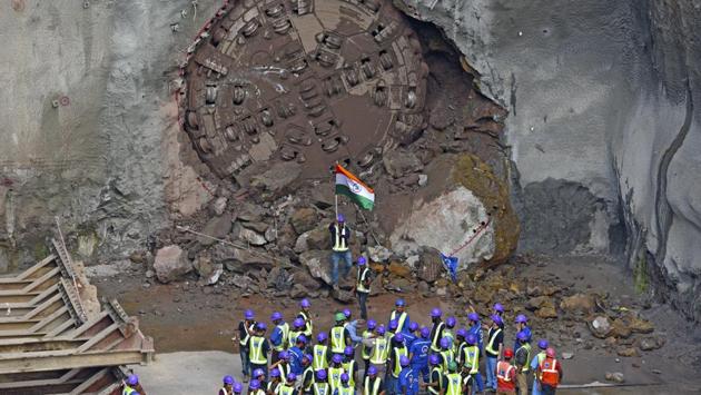Celebrations at the breakthrough of a tunnel for the Mumbai Metro-3 project at Chhatrapati Shivaji International Airport in Mumbai, Maharashtra, on February 12. Later in the year, a proposal to fell as many as 2,700 trees in Aarey for a Metro car shed was met with massive protests that saw arrests and detention of more than two dozen activists, triggering an outcry with the Supreme Court putting a stay on further felling. (Pramod Thakur/HT Photo) Celebrations at the breakthrough of a tunnel for the Mumbai Metro-3 project at Chhatrapati Shivaji International Airport in Mumbai, Maharashtra, on February 12. Later in the year, a proposal to fell as many as 2,700 trees in Aarey for a Metro car shed was met with massive protests that saw arrests and detention of more than two dozen activists, triggering an outcry with the Supreme Court putting a stay on further felling. (Pramod Thakur/HT Photo)