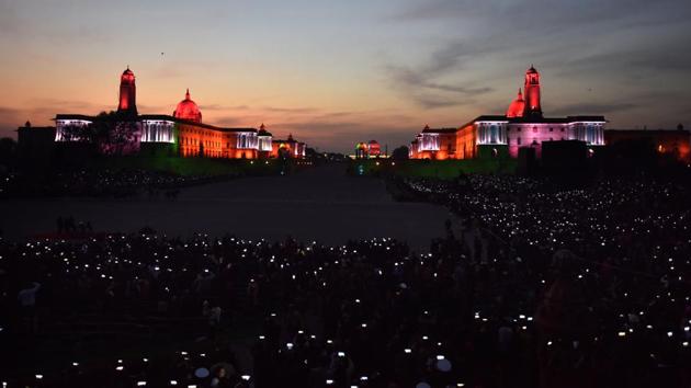Members of the audience wave their mobile phones to add light to the illuminated Raisina Hills during the Beating Retreat ceremony at Vijay Chowk in New Delhi on January 29. Republic Day, the commemoration of the day when the Constitution came into effect, is a grand affair every year. This year India celebrated its 70th Republic Day. (Sonu Mehta/HT Photo) Members of the audience wave their mobile phones to add light to the illuminated Raisina Hills during the Beating Retreat ceremony at Vijay Chowk in New Delhi on January 29. Republic Day, the commemoration of the day when the Constitution came into effect, is a grand affair every year. This year India celebrated its 70th Republic Day. (Sonu Mehta/HT Photo)