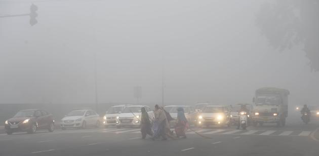 Commuters are seen amid dense fog, near India Gate, in New Delhi. “Delhi is facing cold weather for the past few weeks. The cold is more severe than the hilly areas. The mean temperatures are lower here because of fog and no sunshine. Because of the cold weather, there is a rise of 15-20 per cent in the number of patients in OPD,” AIIMS Director Dr Randeep Guleria said on Monday. (Arvind Yadav / HT Photo) Commuters are seen amid dense fog, near India Gate, in New Delhi. “Delhi is facing cold weather for the past few weeks. The cold is more severe than the hilly areas. The mean temperatures are lower here because of fog and no sunshine. Because of the cold weather, there is a rise of 15-20 per cent in the number of patients in OPD,” AIIMS Director Dr Randeep Guleria said on Monday. (Arvind Yadav / HT Photo)