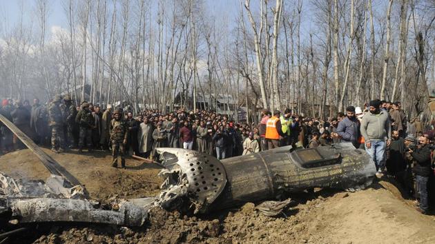 Villagers gather near the wreckage of an Indian Air Force helicopter after it crashed in Budgam area on February 27. The chopper went down just a day after India’s air strike on a Jaish-e-Mohammed (JeM) terror camp in Pakistan’s Balakot in response to the Pulwama terror attack. The same day India responded to airspace intrusions by Pakistan in the Nowshera sector of Jammu and Kashmir‘s Rajouri district. (Waseem Andrabi/HT Photo) Villagers gather near the wreckage of an Indian Air Force helicopter after it crashed in Budgam area on February 27. The chopper went down just a day after India’s air strike on a Jaish-e-Mohammed (JeM) terror camp in Pakistan’s Balakot in response to the Pulwama terror attack. The same day India responded to airspace intrusions by Pakistan in the Nowshera sector of Jammu and Kashmir‘s Rajouri district. (Waseem Andrabi/HT Photo)