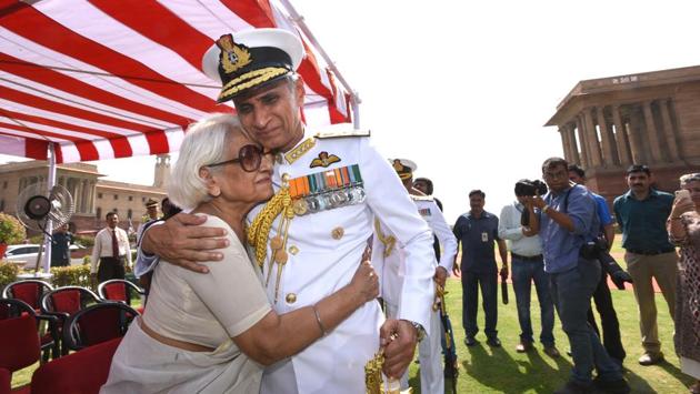 Admiral Karambir Singh hugs his mother during a handover ceremony where he assumed charge as the new Chief of Naval Staff from outgoing Naval chief Sunil Lanba at South block in New Delhi on May 31. Singh superseded Vice Admiral Bimal Verma and became the first helicopter pilot of the navy to head the service. (Arvind Yadav/HT Photo) Admiral Karambir Singh hugs his mother during a handover ceremony where he assumed charge as the new Chief of Naval Staff from outgoing Naval chief Sunil Lanba at South block in New Delhi on May 31. Singh superseded Vice Admiral Bimal Verma and became the first helicopter pilot of the navy to head the service. (Arvind Yadav/HT Photo)