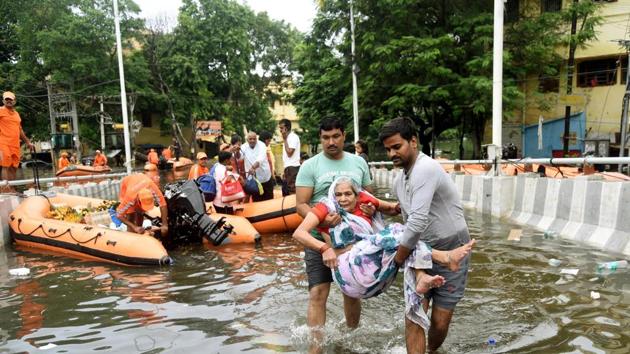 NDRF teams rescue people from Rajendra Nagar area in Patna, Bihar, on October 1. At least 130 people were killed and close to 90 lakh displaced in 13 districts, when torrential rainfall in October brought life to a grinding halt in Bihar. Residents had to be evacuated from their houses or remained stranded for days, subsisting on aid air-dropped from IAF helicopters or supplied through disaster management forces reaching out to them on boats. (Santosh Kumar/HT Photo) NDRF teams rescue people from Rajendra Nagar area in Patna, Bihar, on October 1. At least 130 people were killed and close to 90 lakh displaced in 13 districts, when torrential rainfall in October brought life to a grinding halt in Bihar. Residents had to be evacuated from their houses or remained stranded for days, subsisting on aid air-dropped from IAF helicopters or supplied through disaster management forces reaching out to them on boats. (Santosh Kumar/HT Photo)