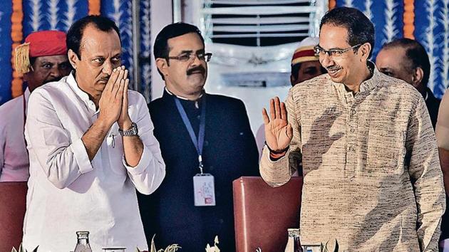 NCP leader Ajit Pawar with chief minister Uddhav Thackeray during the swearing-in ceremony for Maharashtra cabinet at Vidhan Bhavan in Mumbai on Monday.(PTI)