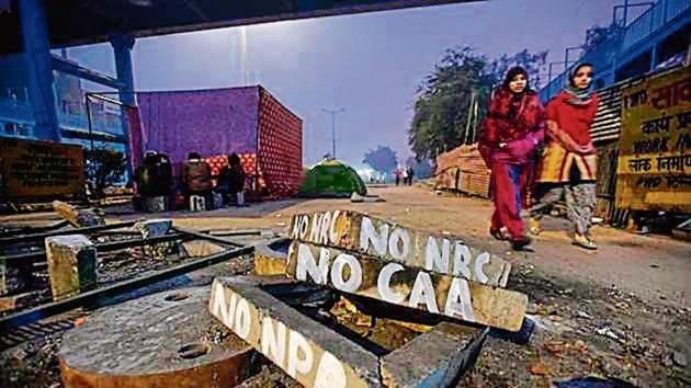 Graffiti on concrete blocks near a protest site against the National Register of Citizens (NRC), at Shaheen Bagh. (Burhaan Kinu/HT PHOTO) Graffiti on concrete blocks near a protest site against the National Register of Citizens (NRC), at Shaheen Bagh. (Burhaan Kinu/HT PHOTO)
